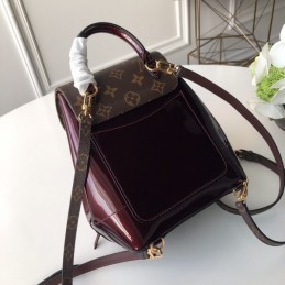 Replica Louis Vuitton Brown Monogram Burgundy Hot Springs Backpack