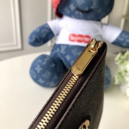 Replica Louis Vuitton Brown Monogram Travel Patch City Pouch