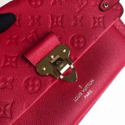 Replica Louis Vuitton Fuchsia Embossed Monogram Vavin PM