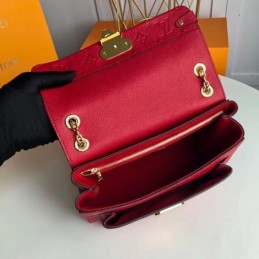 Replica Louis Vuitton Fuchsia Embossed Monogram Vavin PM