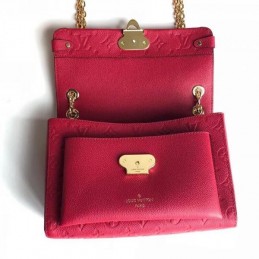 Replica Louis Vuitton Fuchsia Embossed Monogram Vavin PM