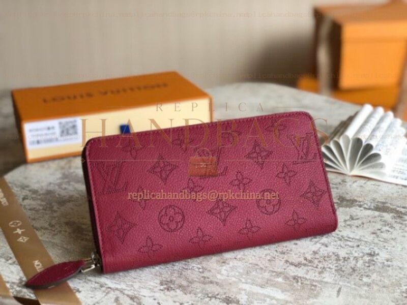 Replica Louis Vuitton Fuchsia Embossed Monogram Zippy Wallet