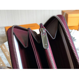 Replica Louis Vuitton Fuchsia Embossed Monogram Zippy Wallet