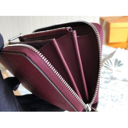 Replica Louis Vuitton Fuchsia Embossed Monogram Zippy Wallet