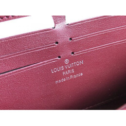 Replica Louis Vuitton Fuchsia Embossed Monogram Zippy Wallet