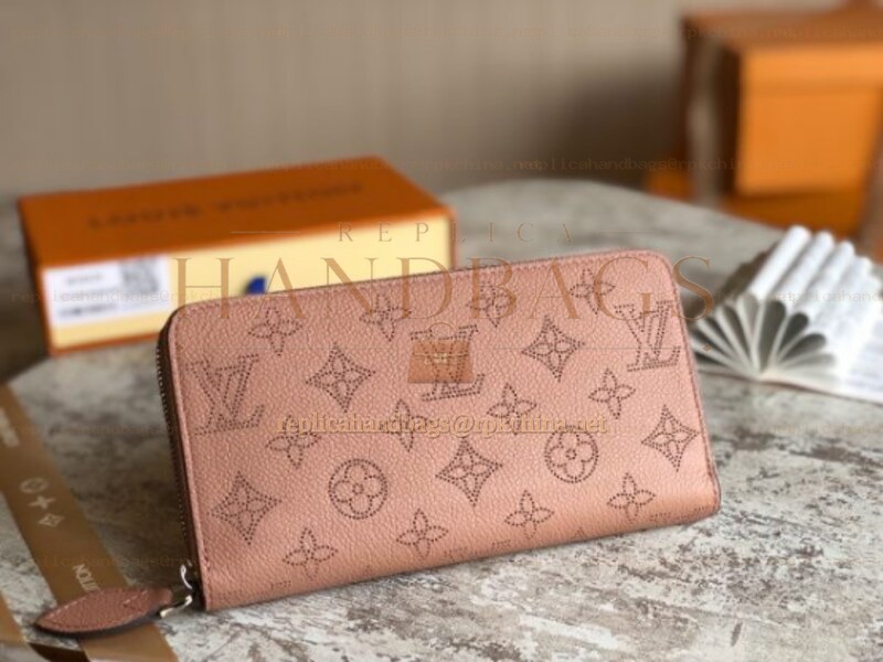 Replica Louis Vuitton Pale Pink Embossed Monogram Zippy Wallet