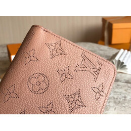 Replica Louis Vuitton Pale Pink Embossed Monogram Zippy Wallet