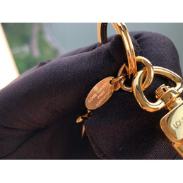 Replica Louis Vuitton Gold LV Initials Key Holder Charm