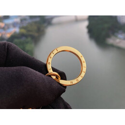 Replica Louis Vuitton Gold Round LV Logo Key Holder Charm