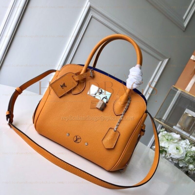 Replica Louis Vuitton Orange Textured Milla PM