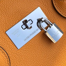 Replica Louis Vuitton Orange Textured Milla PM
