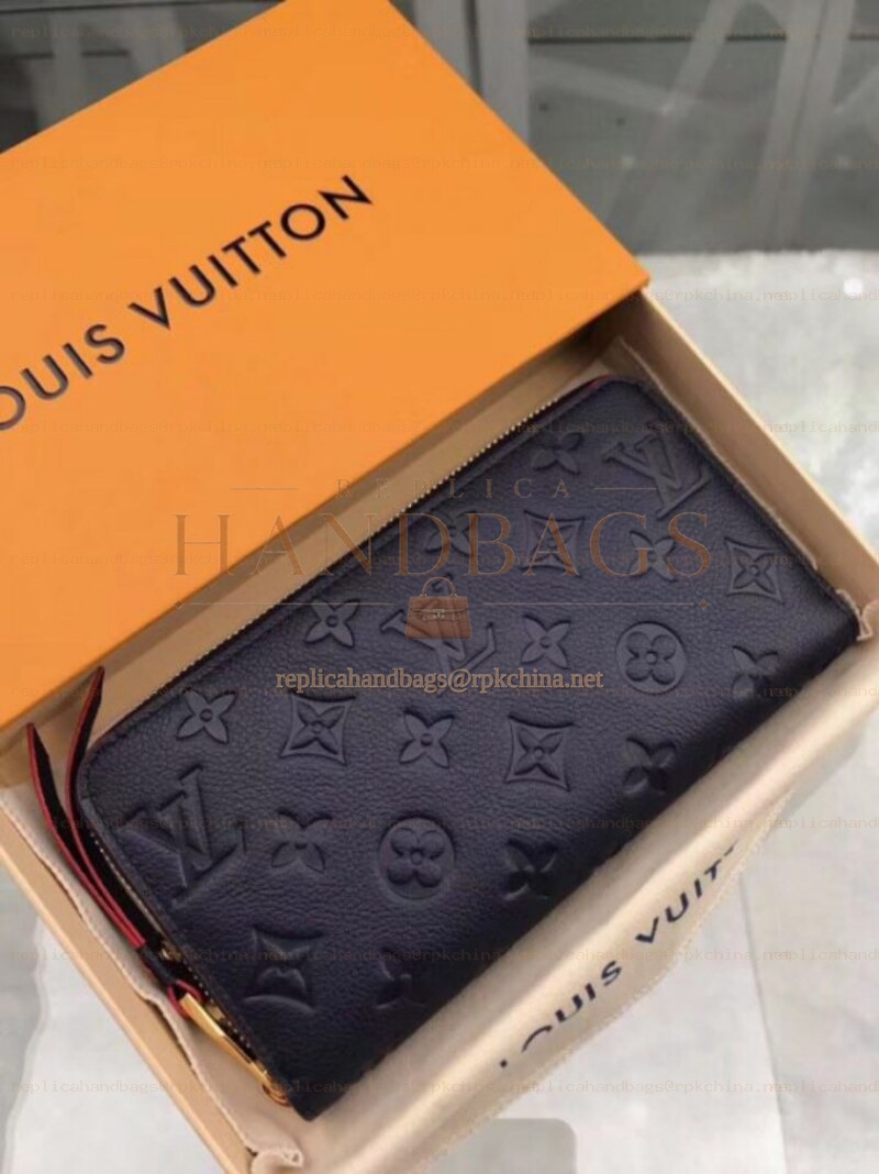 Replica Louis Vuitton Black Oversized Embossed Monogram Zippy Wallet