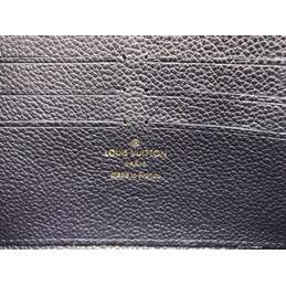 Replica Louis Vuitton Black Oversized Embossed Monogram Zippy Wallet