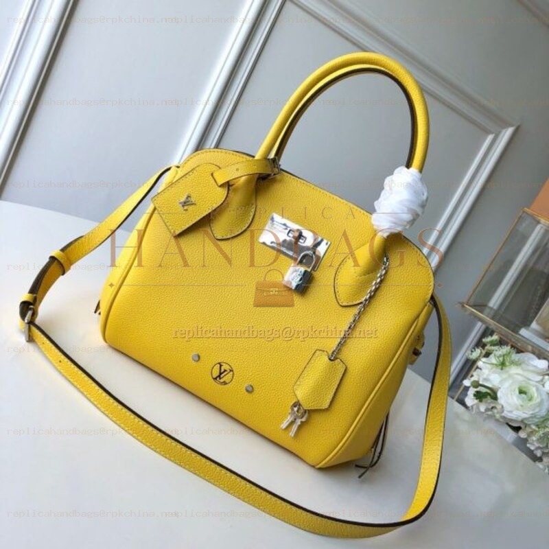 Replica Louis Vuitton Yellow Textured Milla PM