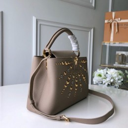 Replica Louis Vuitton Beige Gold Studded Capucines PM