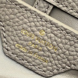Replica Louis Vuitton Beige Gold Studded Capucines PM