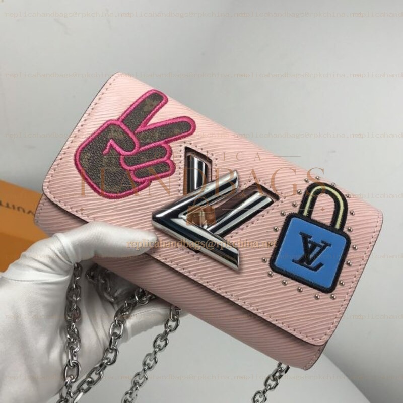 Replica Louis Vuitton Pale Pink Graphic Twist Chain Wallet