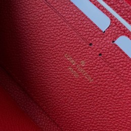 Replica Louis Vuitton Pale Pink Embossed Monogram Red Charm Clemence Wallet