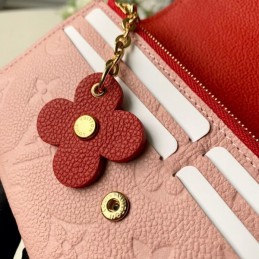 Replica Louis Vuitton Pale Pink Embossed Monogram Flower Emilie Wallet
