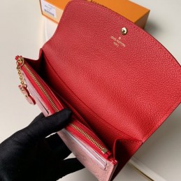 Replica Louis Vuitton Pale Pink Embossed Monogram Flower Emilie Wallet
