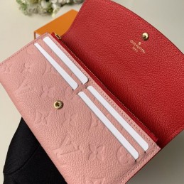 Replica Louis Vuitton Pale Pink Embossed Monogram Flower Emilie Wallet