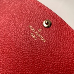 Replica Louis Vuitton Pale Pink Embossed Monogram Flower Emilie Wallet