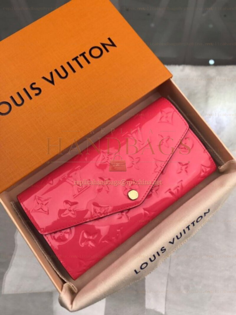 Replica Louis Vuitton Fuchsia Embossed Monogram Sarah Wallet