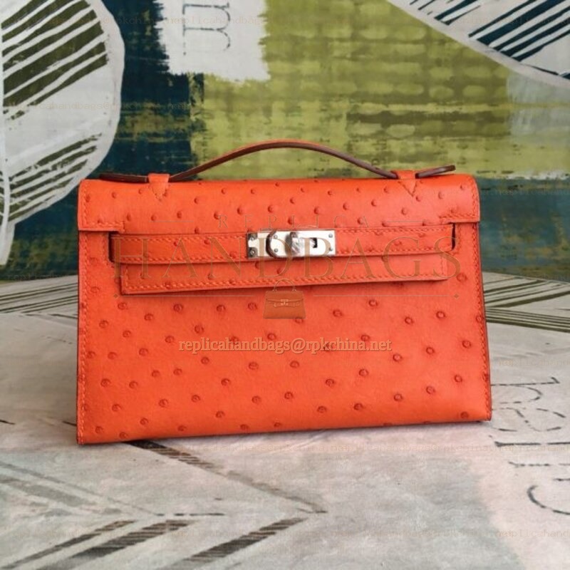 Replica Hermes Orange Ostrich Leather Kelly Pochette Bag