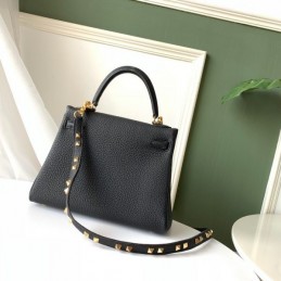 Replica Hermes Black Kelly 25 Skull Charm Strap Bag